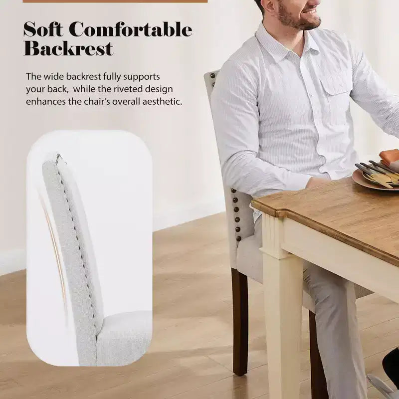 Juego de 2 sillas de comedor modernas sin brazos, tapizadas en tela, con adornos de tachuelas y patas de madera