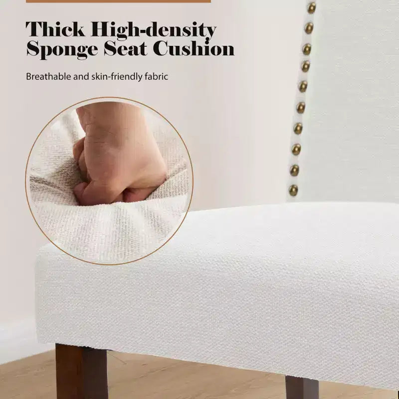 Juego de 2 sillas de comedor modernas sin brazos, tapizadas en tela, con adornos de tachuelas y patas de madera