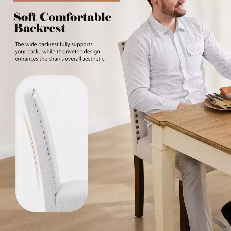 Juego de 2 sillas de comedor modernas sin brazos, tapizadas en tela, con adornos de tachuelas y patas de madera
