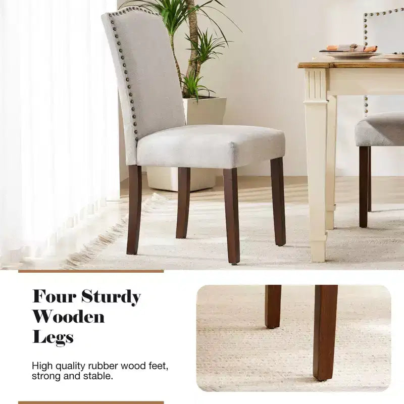Juego de 2 sillas de comedor modernas sin brazos, tapizadas en tela, con adornos de tachuelas y patas de madera